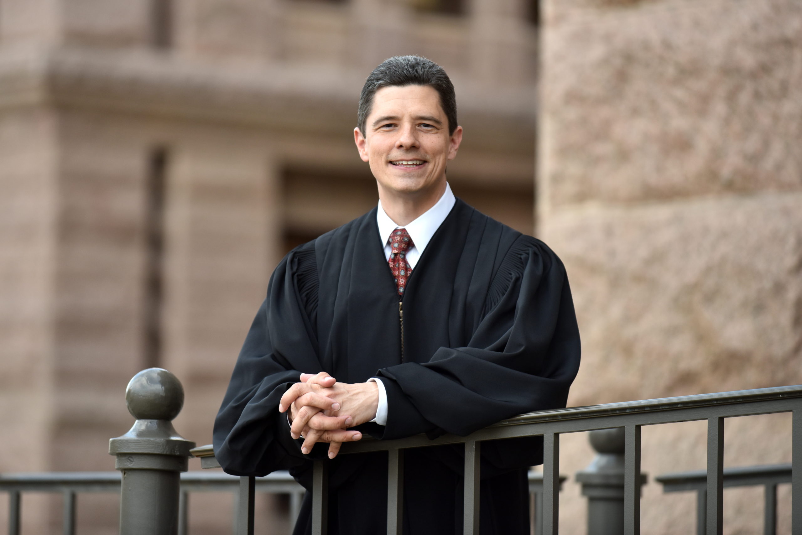 Justice Brett Busby Swears in New Lawyers over Zoom